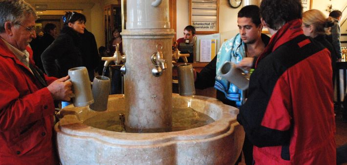 Tom Sawyer would appreciate customers washing their own beer mugs at Augustiner Brewing