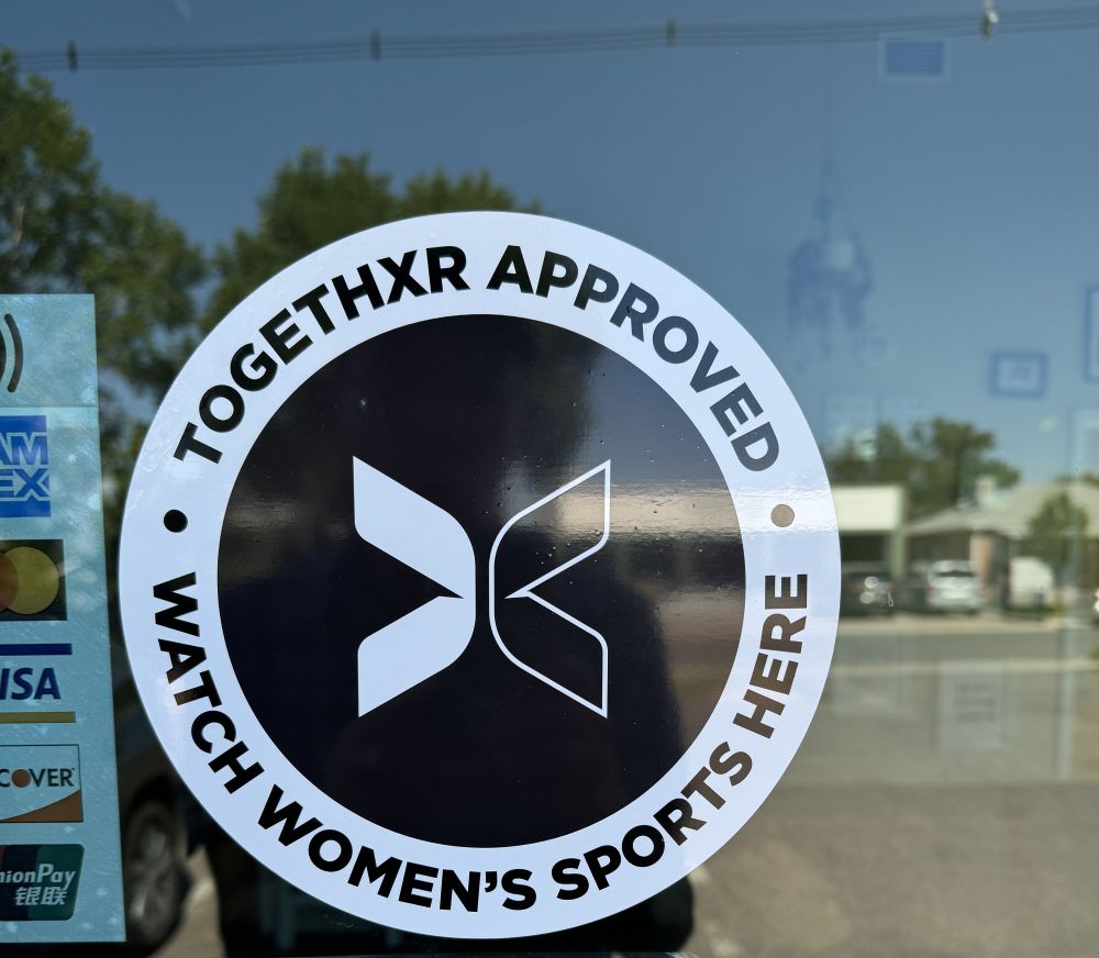 Message on the entry door at Lady Justice Brewing in Englewood,  Colorado.